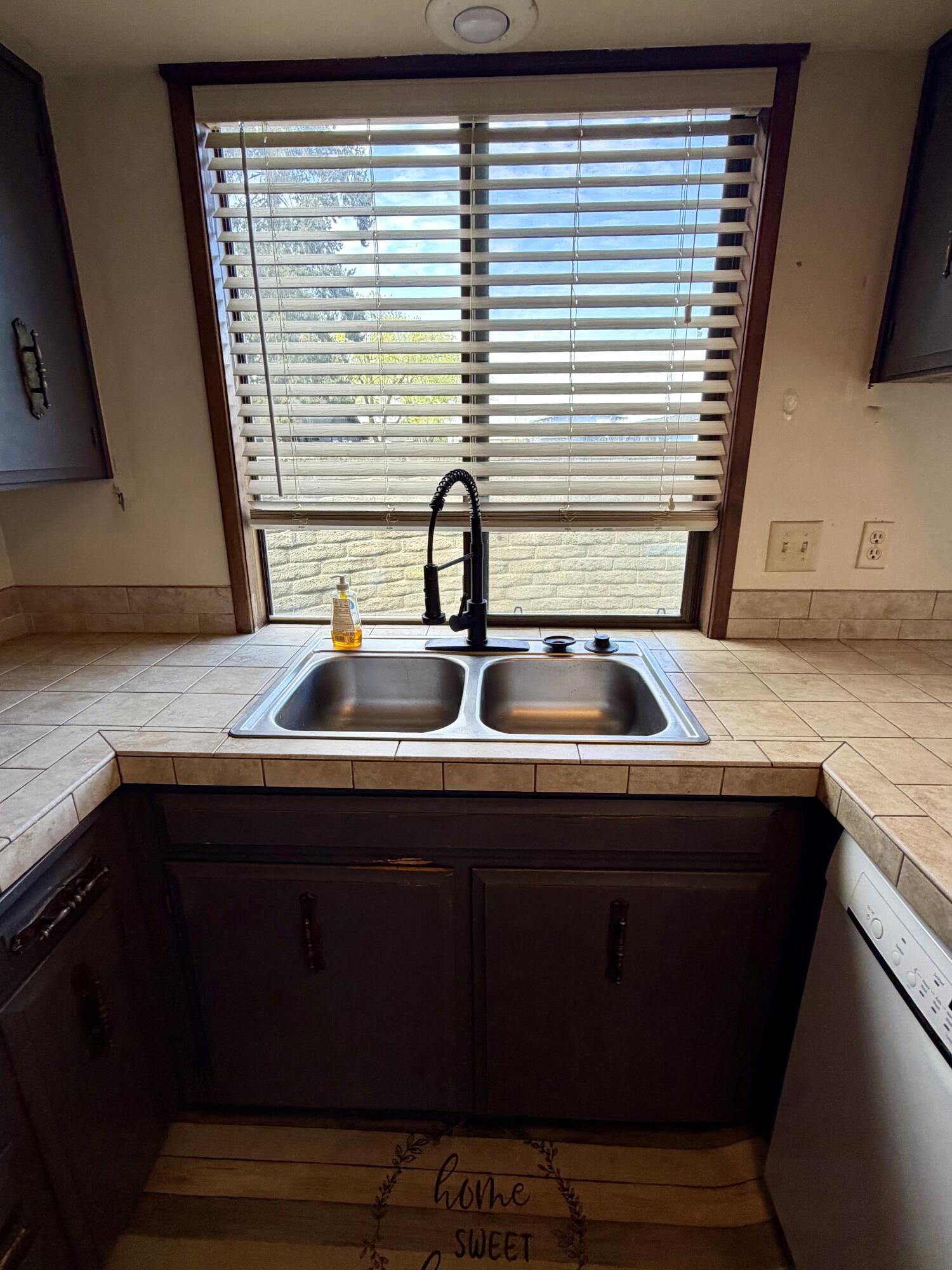 1198 Morrow Road, Unit A Medford, OR 97504 - Photo 11 of 20 a kitchen with a sink and a window