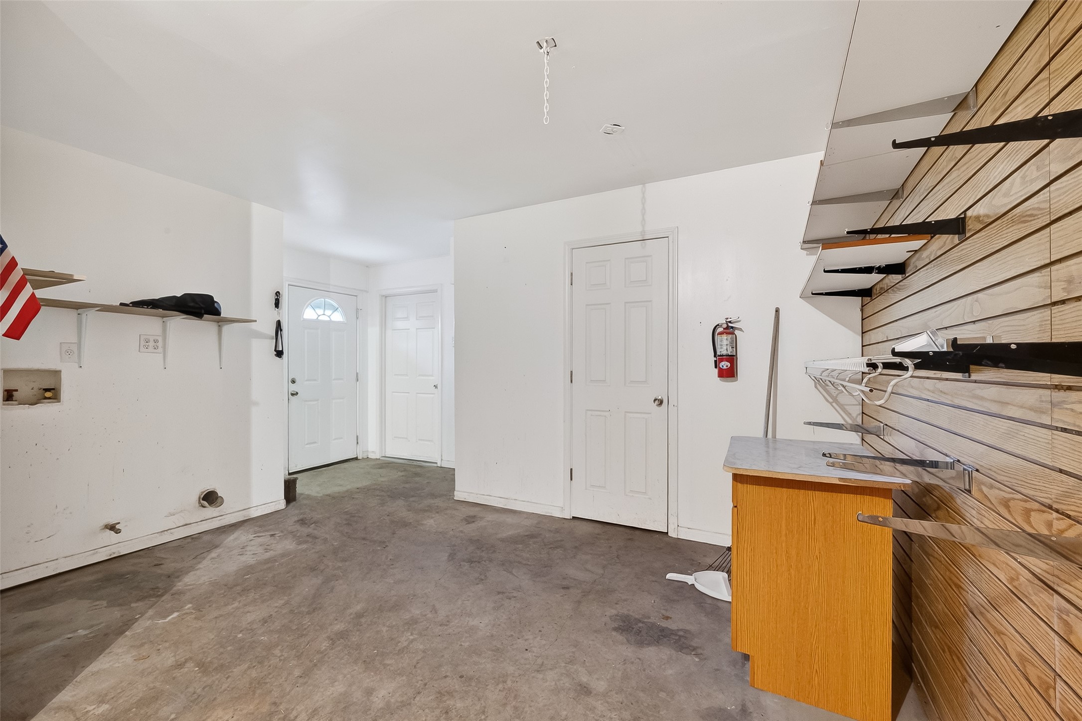 512 Bertloma Street Pasadena, TX 77502 - Photo 27 of 48 a view of a storage & utility room with two washing machine