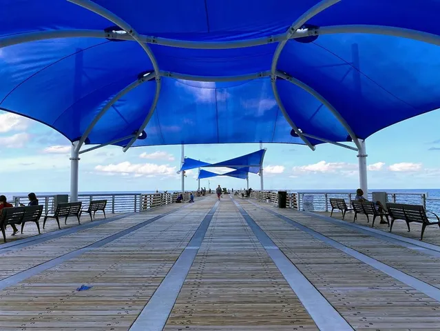 a view of a swimming pool and an outdoor space