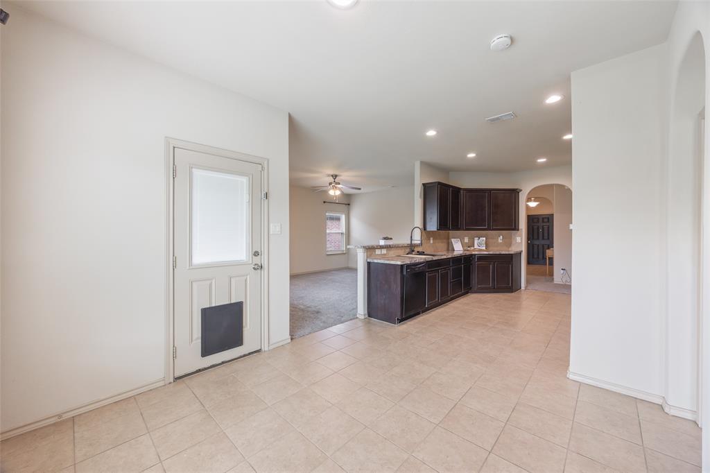 4016 Lazy River Ranch Road Fort Worth, TX 76262 - Photo 15 of 40 Dining area facing kitchen