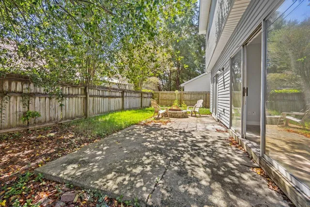 a view of a back yard with green space
