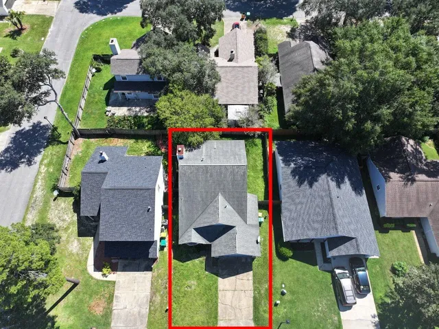 an aerial view of houses and roads