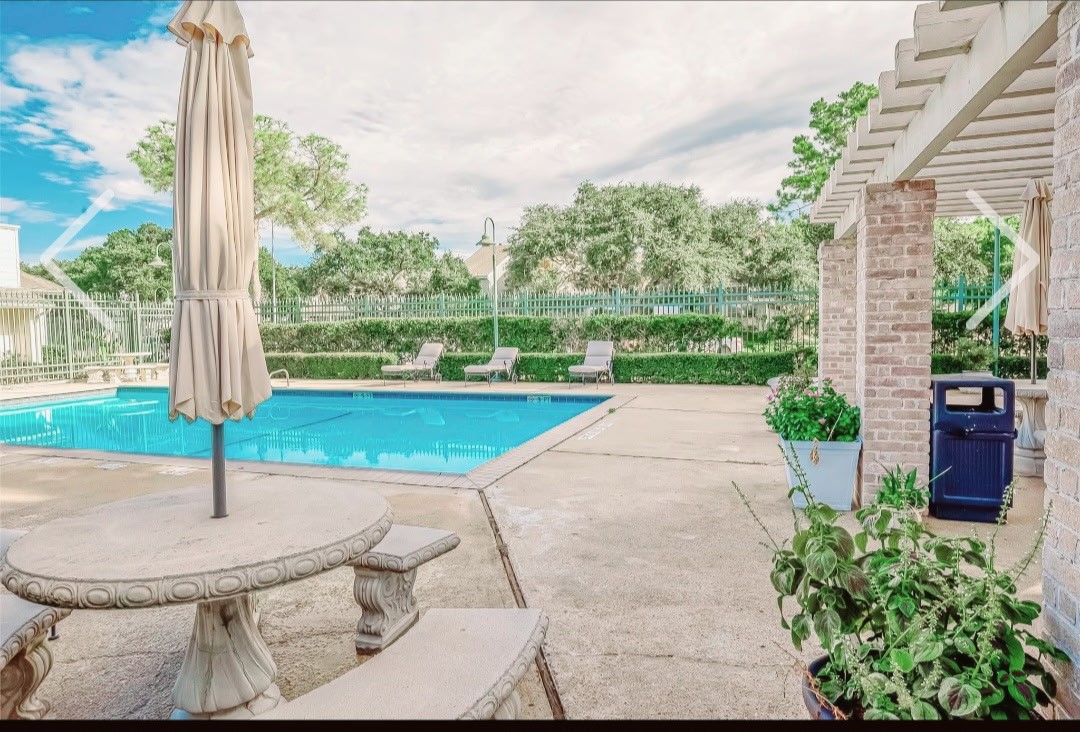 a view of a garden with a fountain
