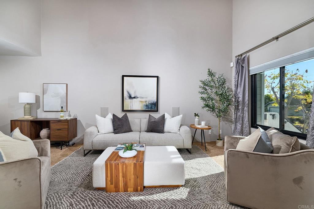 11518 Madera Rosa Way San Diego, CA 92124 - Photo 5 of 42 a living room with furniture and a large window