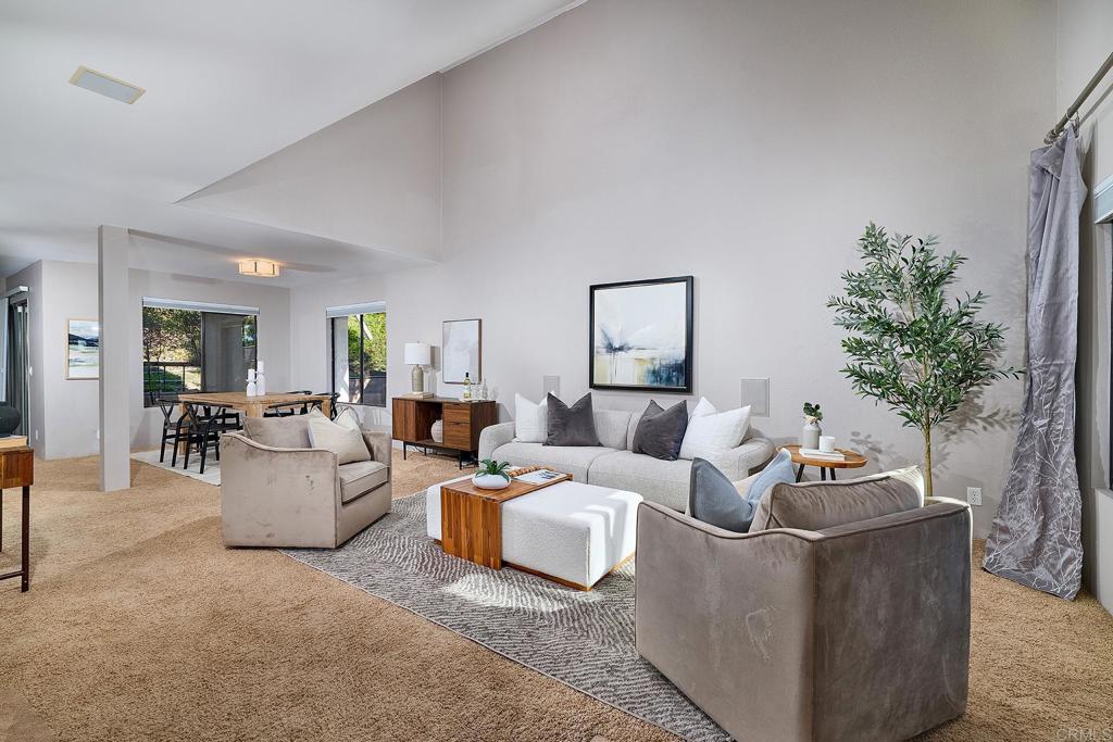 11518 Madera Rosa Way San Diego, CA 92124 - Photo 6 of 42 a living room with furniture and a potted plant