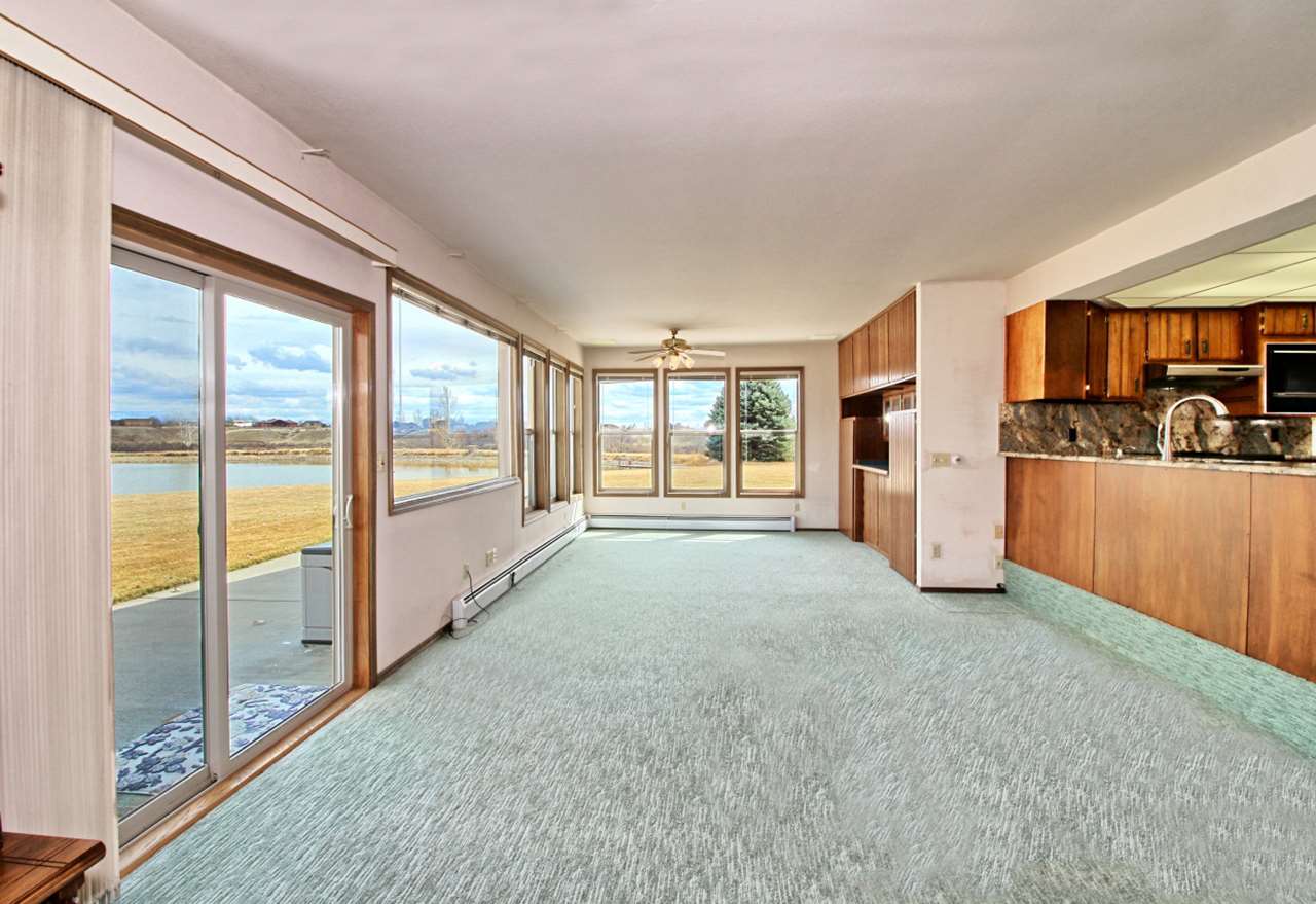 1420 18 Road Fruita, CO 81521 - Photo 22 of 42 a view of an empty room with a window