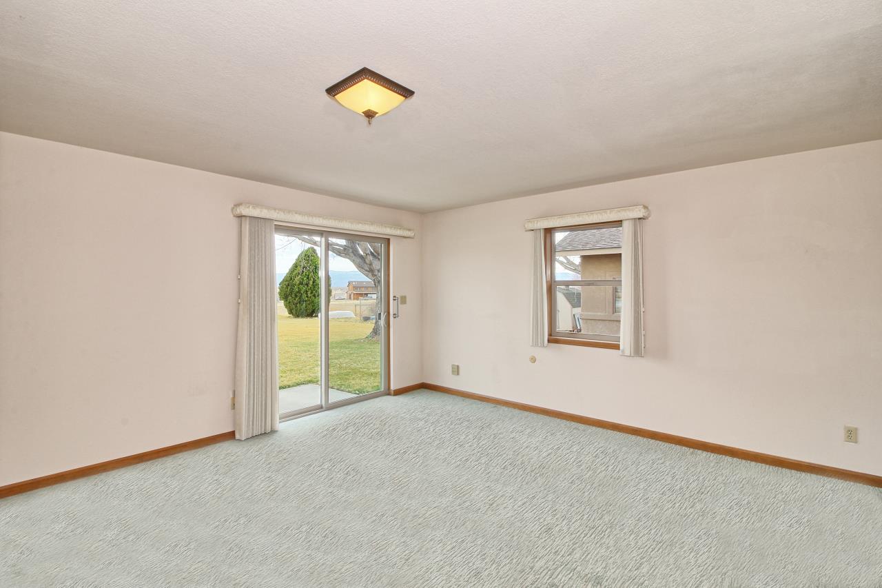 1420 18 Road Fruita, CO 81521 - Photo 27 of 42 a view of an empty room with a window