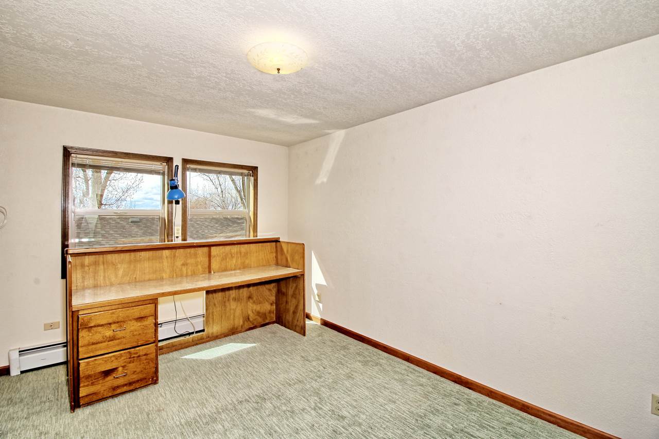 1420 18 Road Fruita, CO 81521 - Photo 31 of 42 an empty room with a window