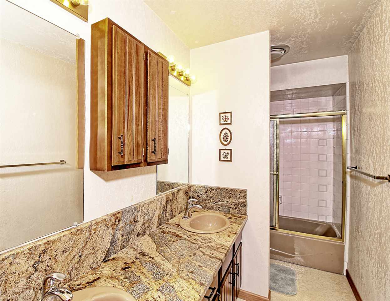 1420 18 Road Fruita, CO 81521 - Photo 34 of 42 a bathroom with a granite countertop sink and a mirror