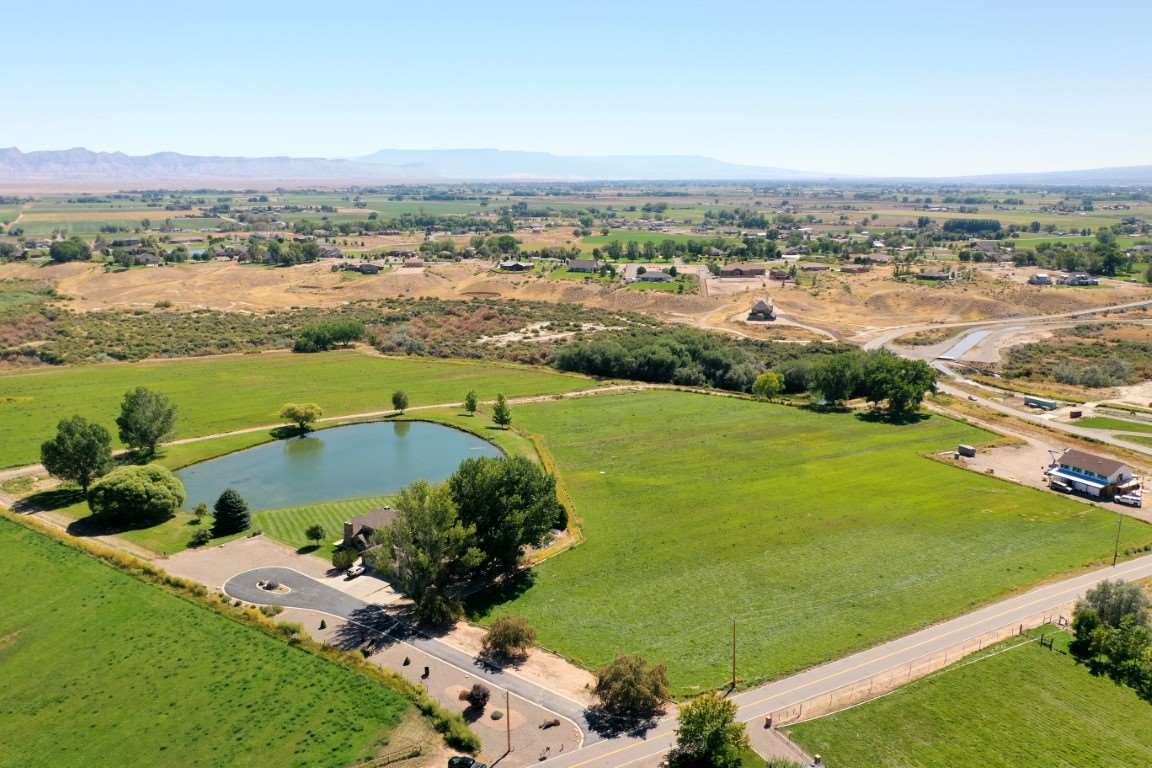 1420 18 Road Fruita, CO 81521 - Photo 40 of 42 a view of a lake with a city