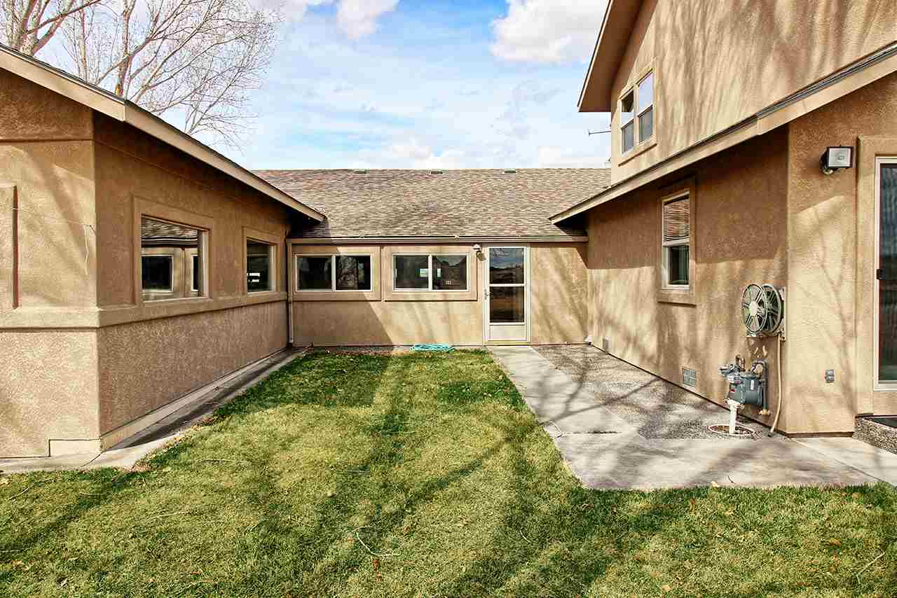 1420 18 Road Fruita, CO 81521 - Photo 8 of 42 a house view with a backyard space