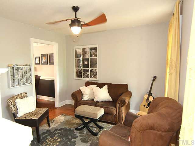 9936 Baileywick Road Raleigh, NC 27613 - Photo 8 of 24 Nice living room...entire first floor has hardwood floors. Living Room