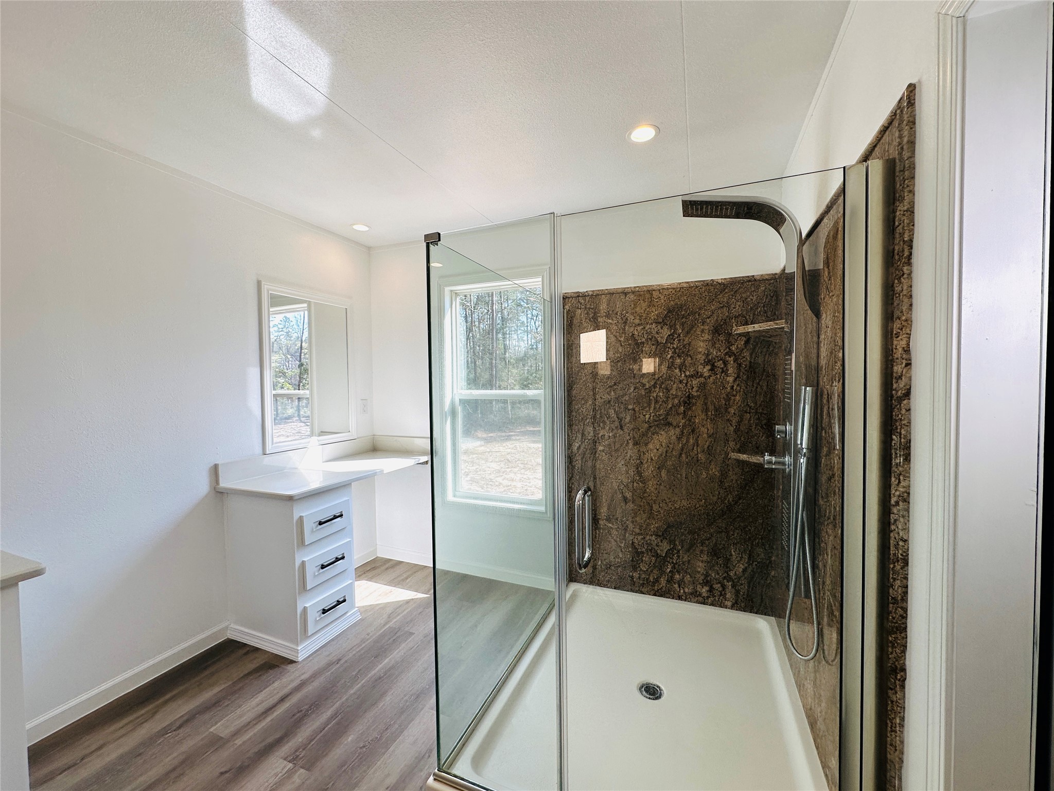 11269 Newton Circle Conroe, TX 77303 - Photo 16 of 39 a bathroom with a bathtub and a shower