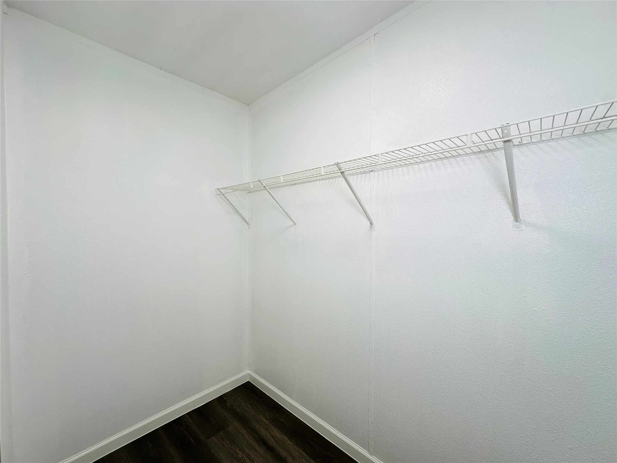 11269 Newton Circle Conroe, TX 77303 - Photo 18 of 39 a view of a room with racks on the wall