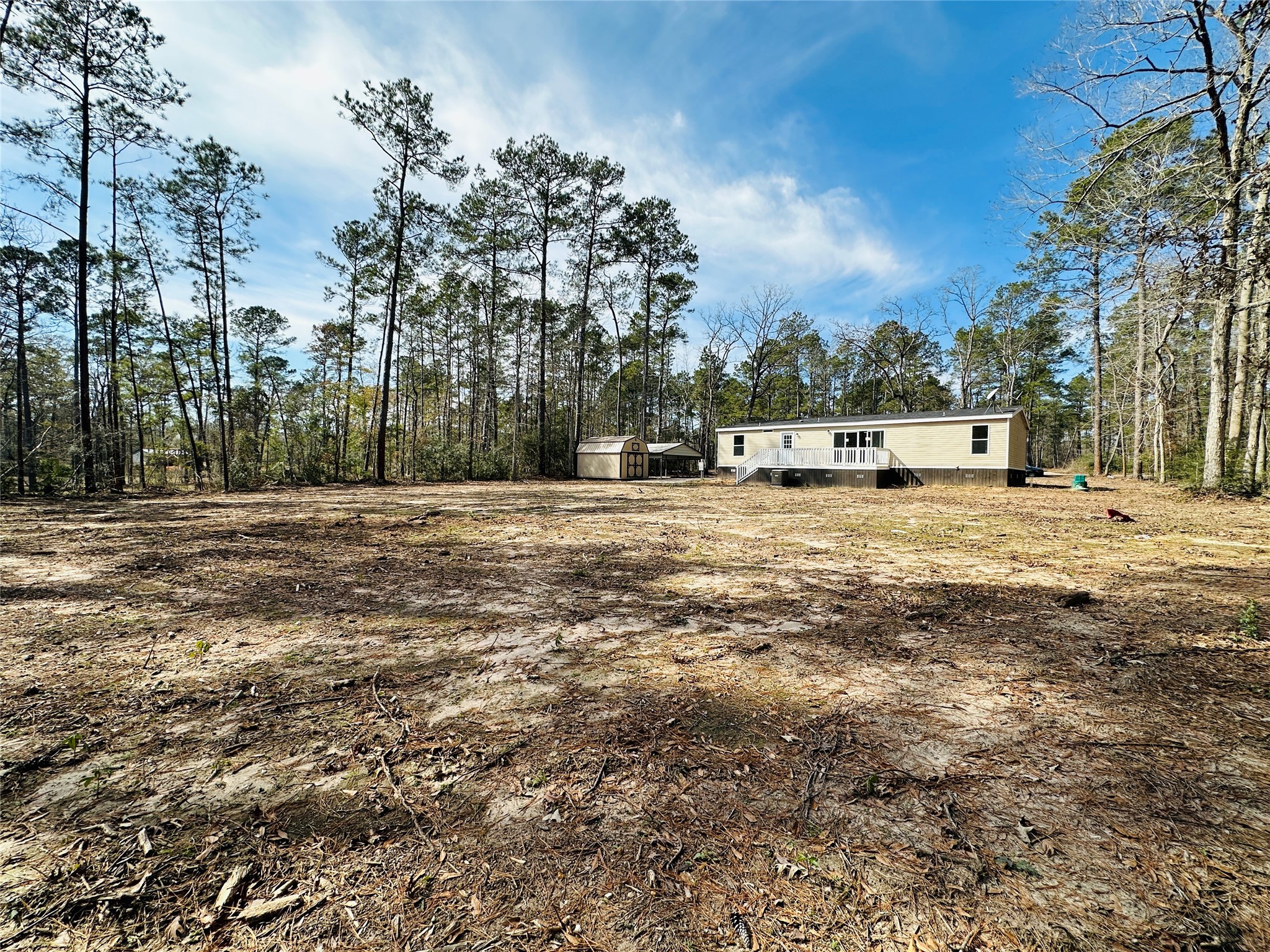 11269 Newton Circle Conroe, TX 77303 - Photo 34 of 39 a view of a field with trees in the background