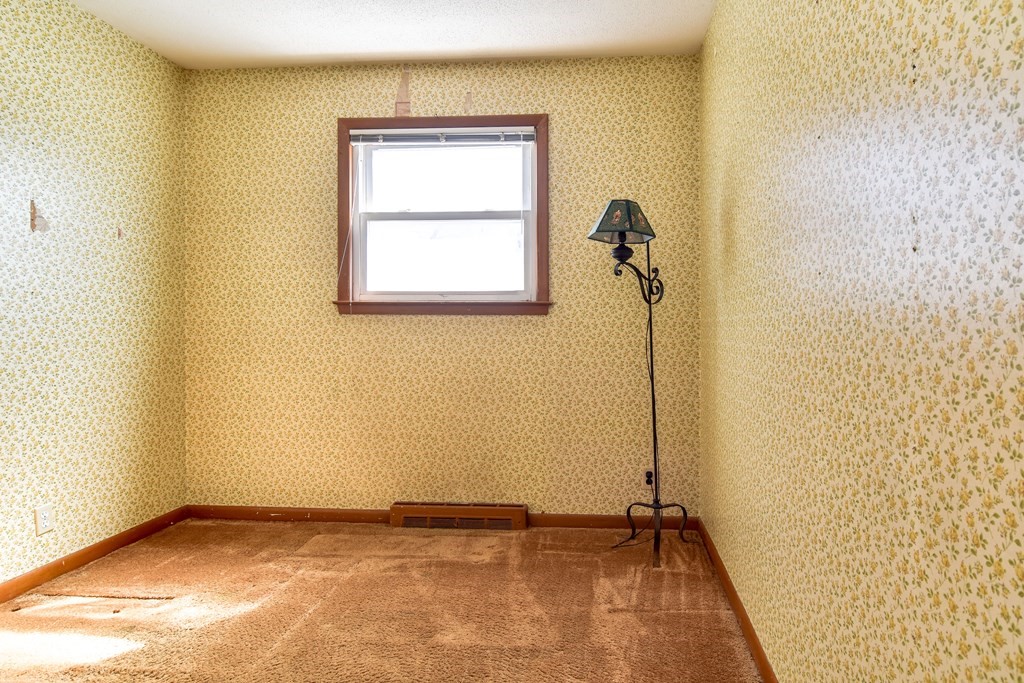 5 Rosenfeld Road Millis, MA 02054 - Photo 14 of 23 a view of an empty room with windows