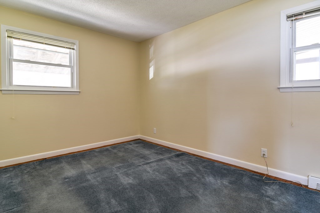 5 Rosenfeld Road Millis, MA 02054 - Photo 16 of 23 an empty room with windows
