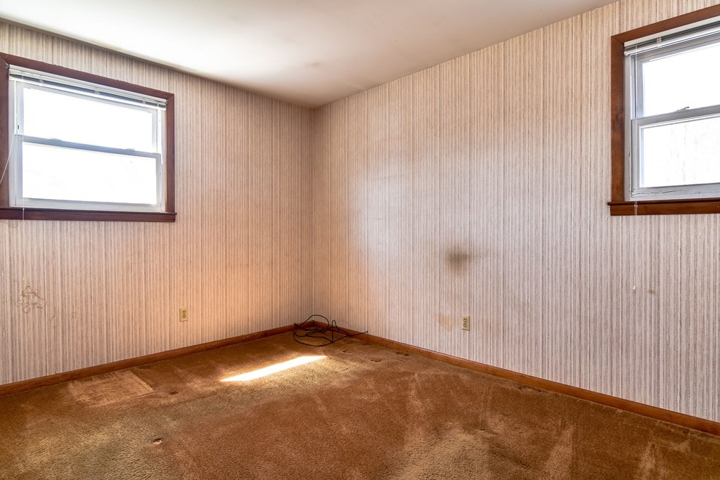 5 Rosenfeld Road Millis, MA 02054 - Photo 19 of 23 an empty room with windows