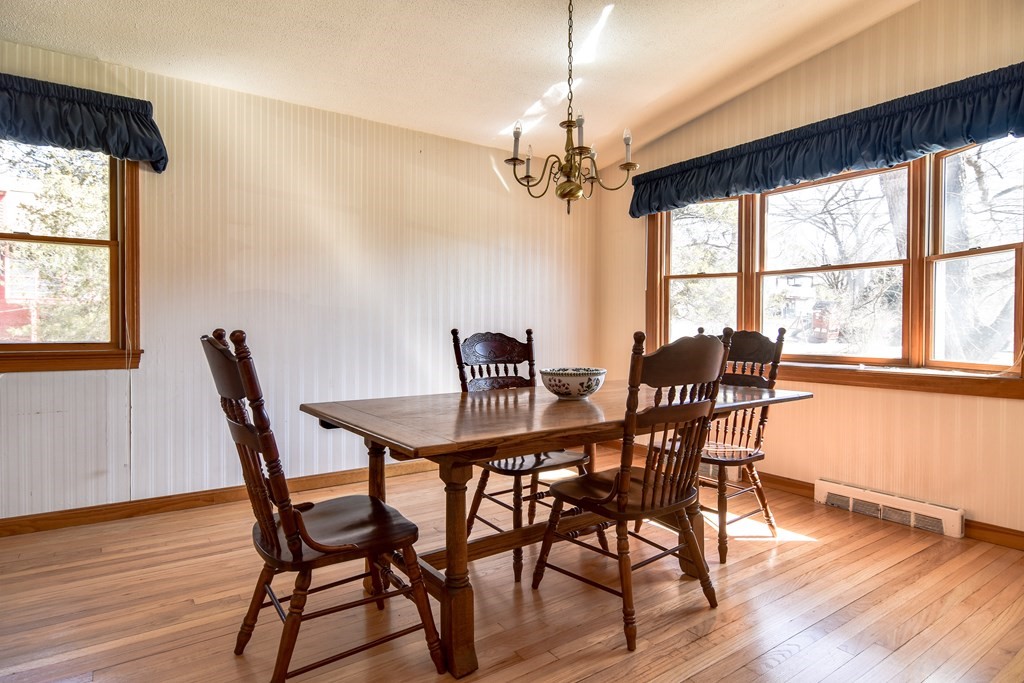 5 Rosenfeld Road Millis, MA 02054 - Photo 3 of 23 a view of a dining room with furniture window and wooden floor