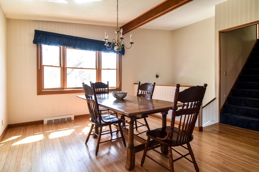 5 Rosenfeld Road Millis, MA 02054 - Photo 4 of 23 a view of a dining room with furniture window and wooden floor