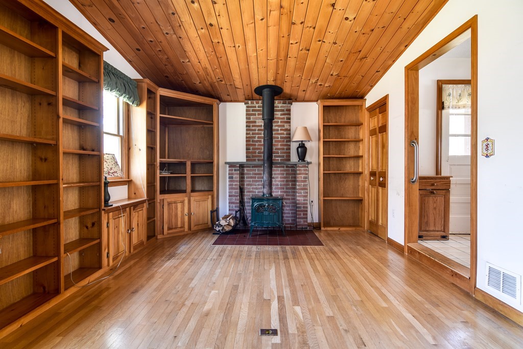 5 Rosenfeld Road Millis, MA 02054 - Photo 10 of 23 a view of an entryway with wooden floor and door