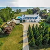 a view of a swimming pool with a yard