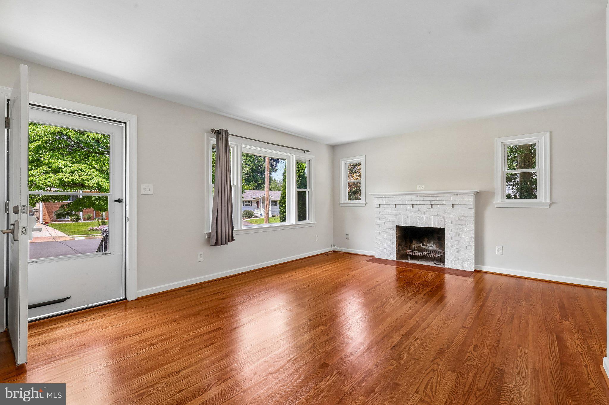 10217 Rodgers Road Fairfax, VA 22030 - Photo 4 of 27 Family/Living Room with refinished wood floors