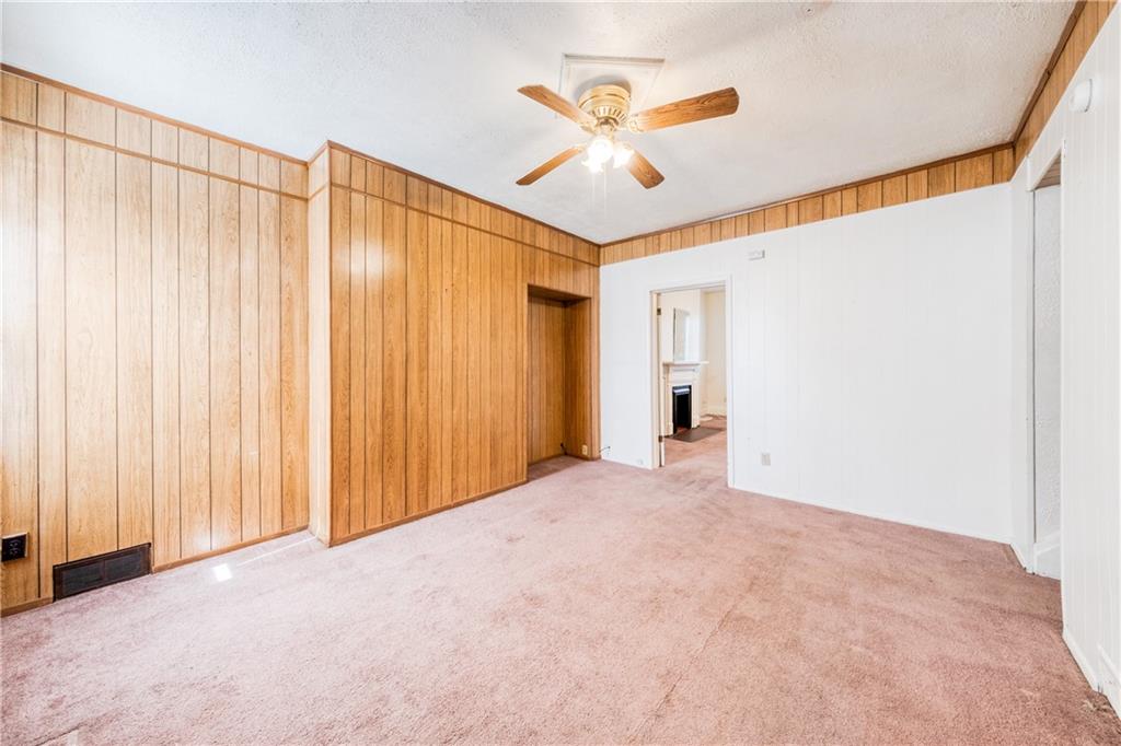 1509 Hatteras Street Pittsburgh, PA 15212 - Photo 15 of 28 a view of a livingroom with a ceiling fan and window