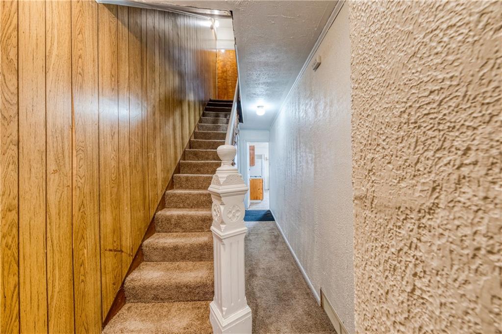 1509 Hatteras Street Pittsburgh, PA 15212 - Photo 22 of 28 a view of a staircase with wooden floor