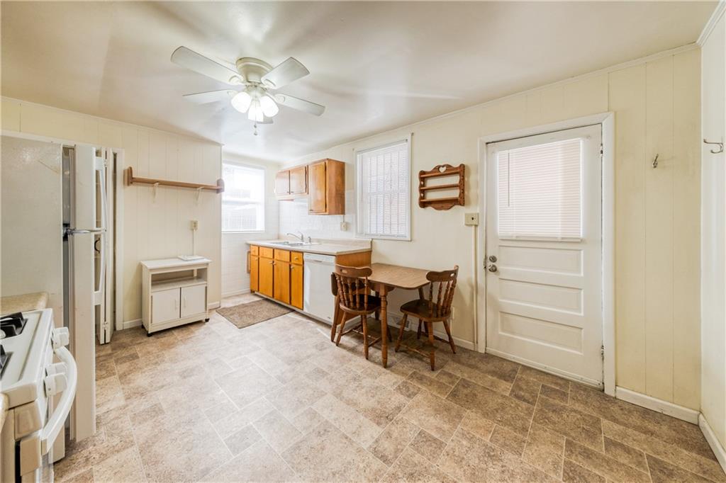 1509 Hatteras Street Pittsburgh, PA 15212 - Photo 5 of 28 a view of a livingroom with furniture and a ceiling fan