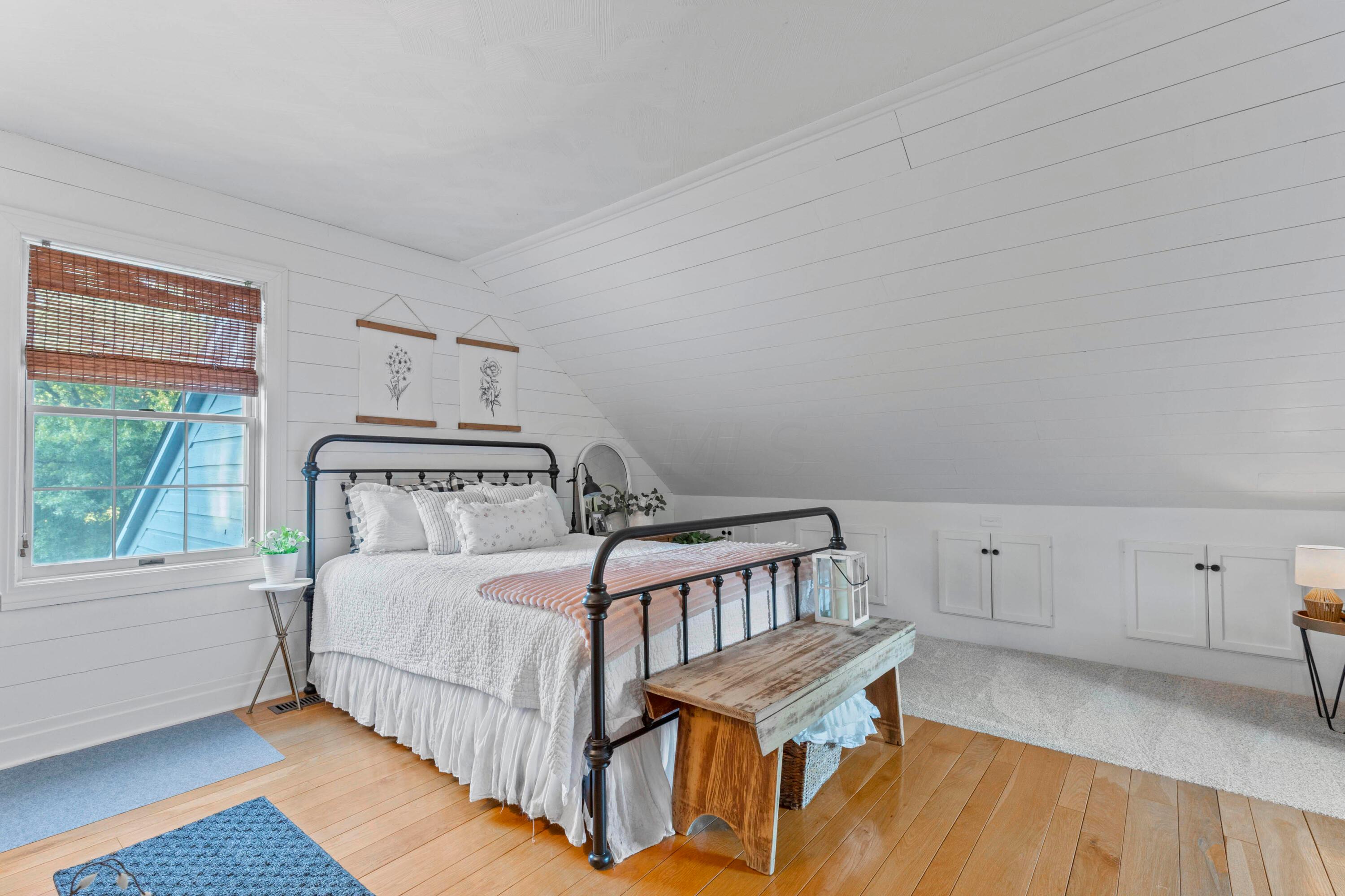 6262 Duffy Road Delaware, OH 43015 - Photo 46 of 96 • Hardwood flooring
• White painted &
shiplap walls
• Angled ceiling
• Attic access
• Shades remain
