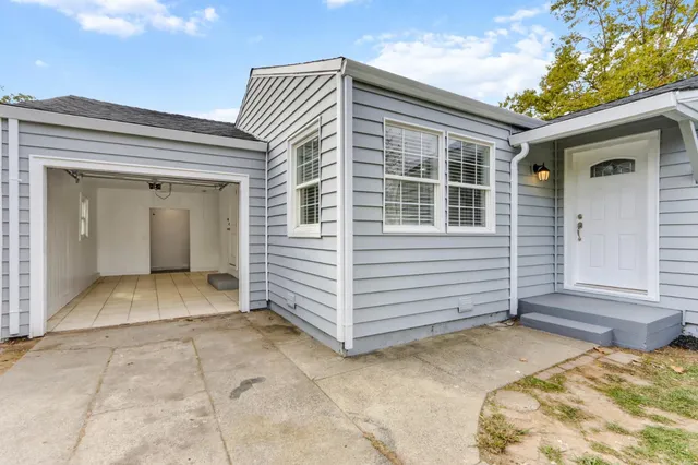 a view of the house with a large window