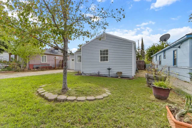 a view of a backyard with a garden