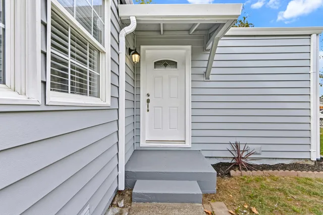 a front view of a house with a window