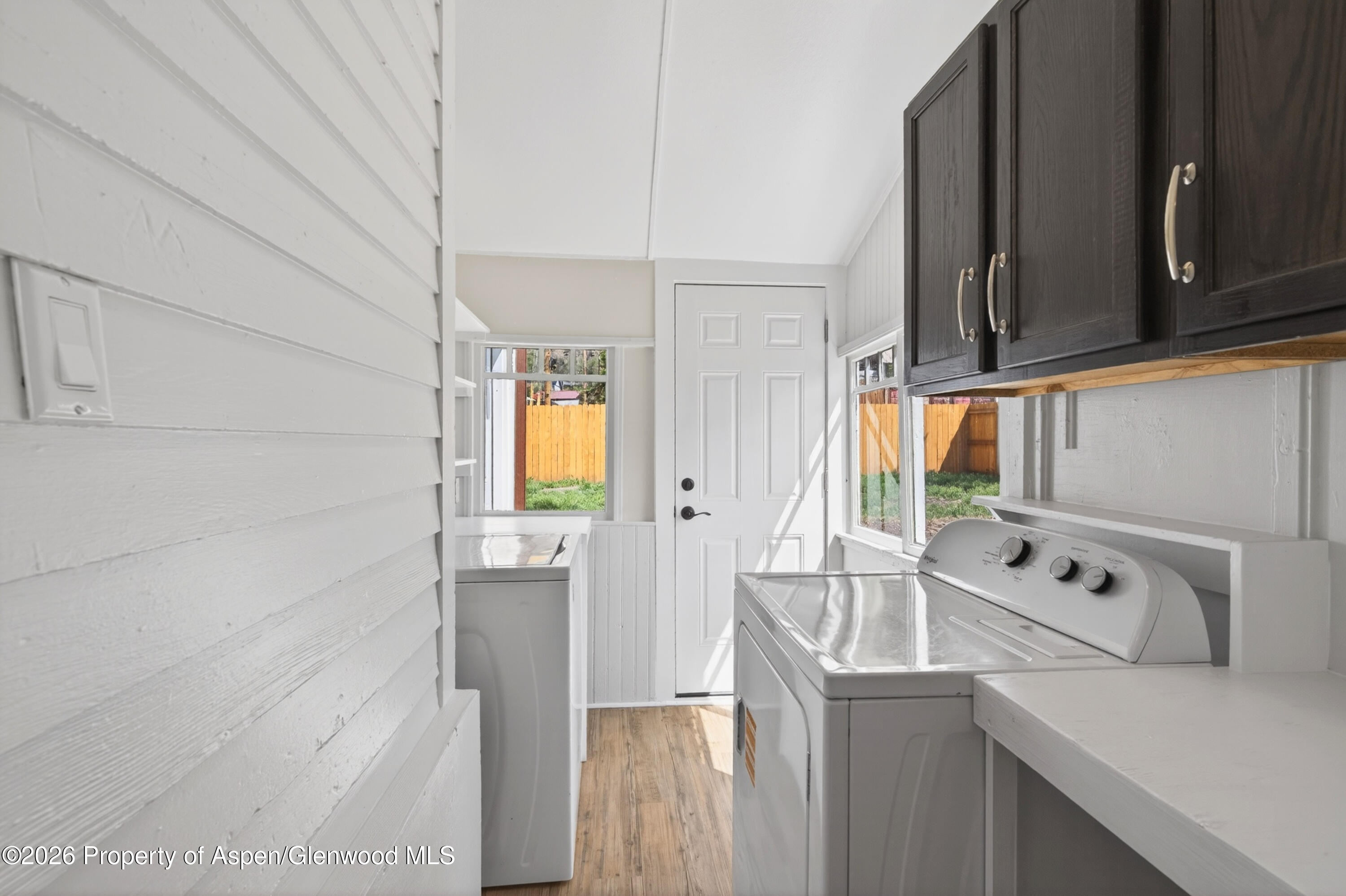 620 West Main Street New Castle, CO 81647 - Photo 16 of 27 a kitchen with stainless steel appliances granite countertop a sink a stove and refrigerator