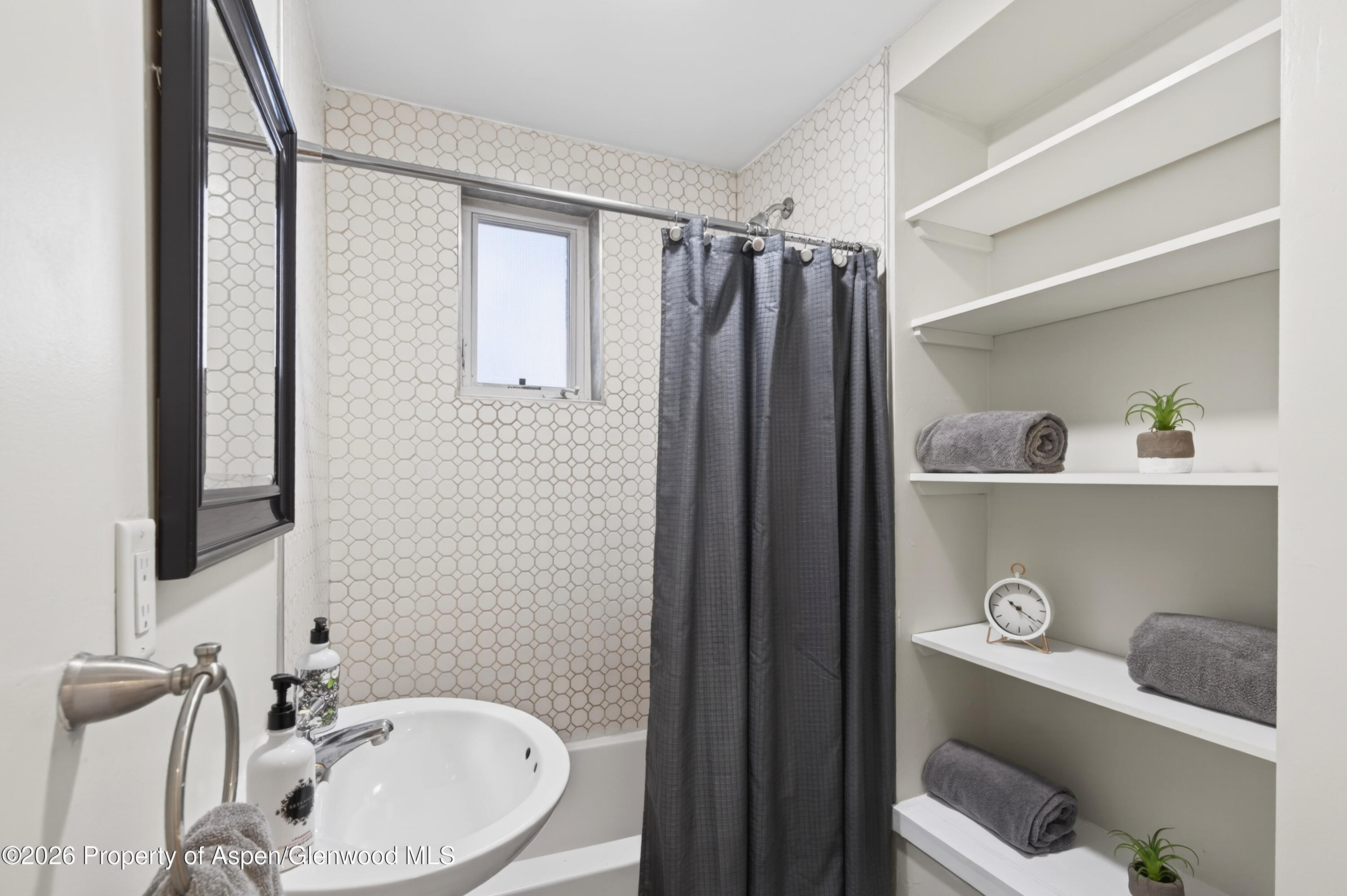 620 West Main Street New Castle, CO 81647 - Photo 18 of 27 a bathroom with a sink a toilet and a mirror