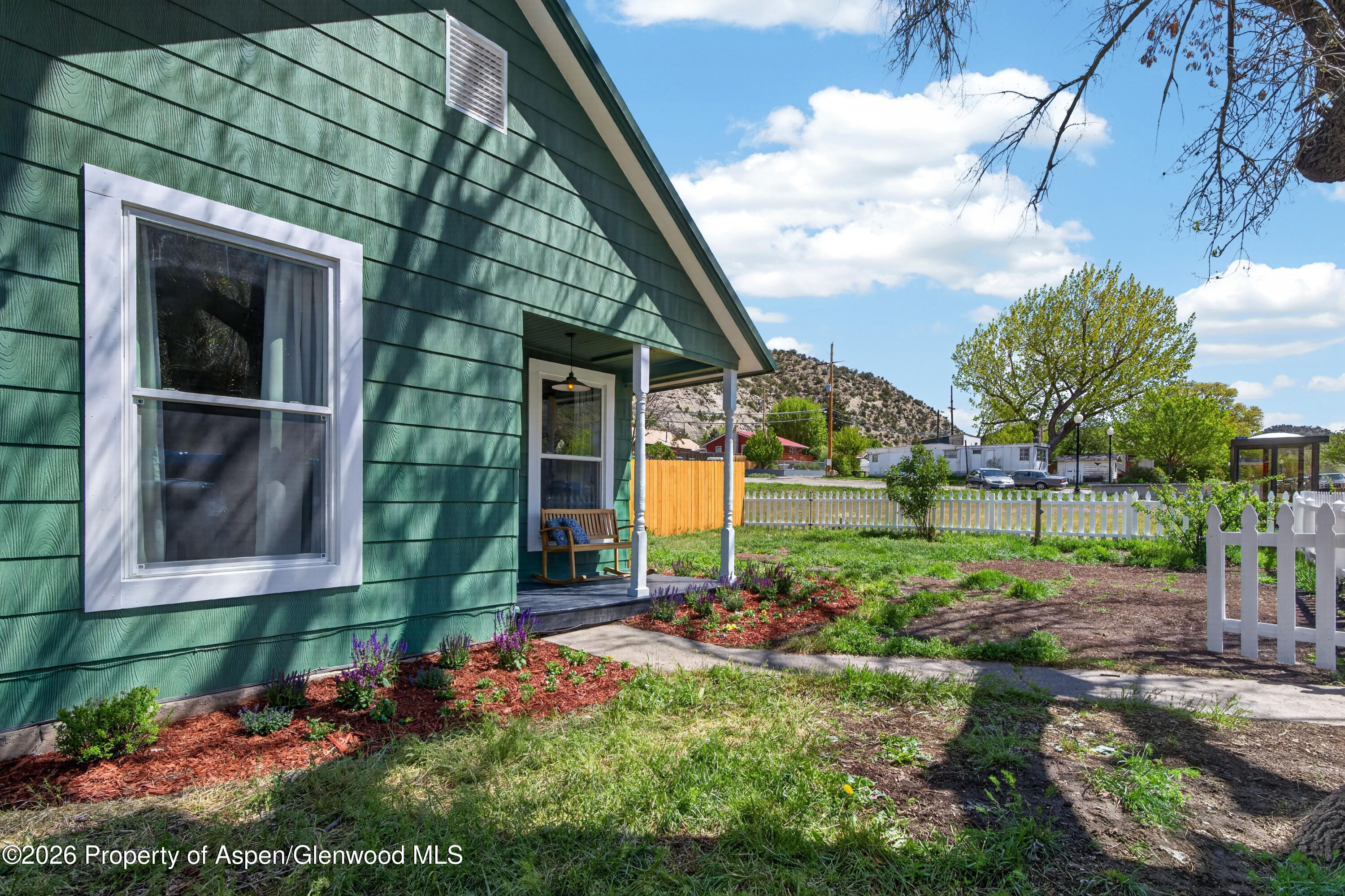 620 West Main Street New Castle, CO 81647 - Photo 24 of 27 a view of a house with backyard and garden