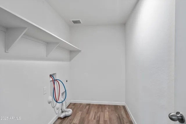 a view of a entryway with racks on the wall