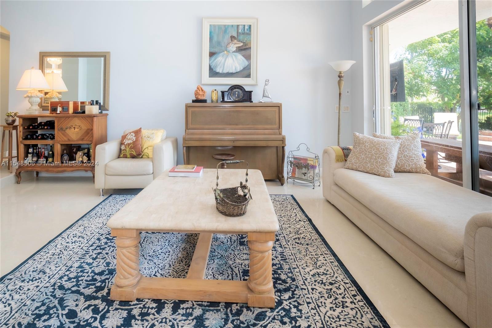 10849-10849 Bal Harbor Drive Boca Raton, FL 33498 - Photo 11 of 72 a living room with furniture and a window