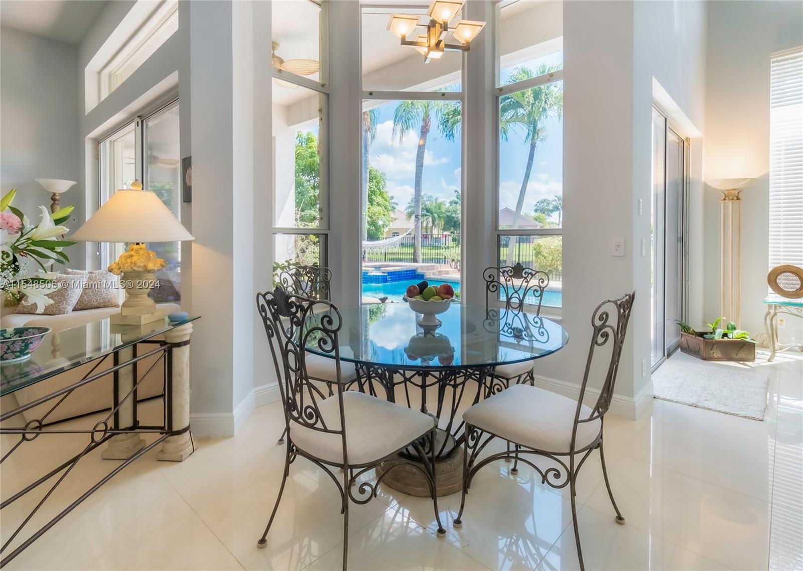 10849-10849 Bal Harbor Drive Boca Raton, FL 33498 - Photo 19 of 72 a view of a dining room with furniture window and outside view