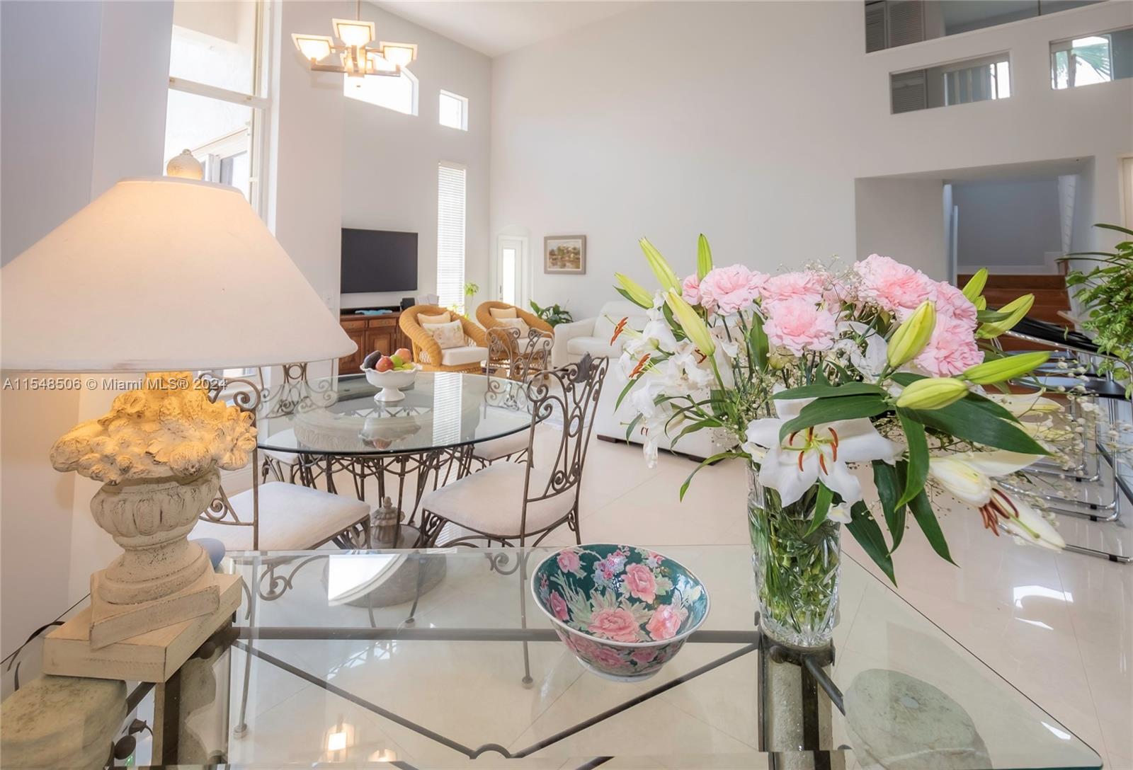 10849-10849 Bal Harbor Drive Boca Raton, FL 33498 - Photo 21 of 72 a dining room with furniture and potted plant