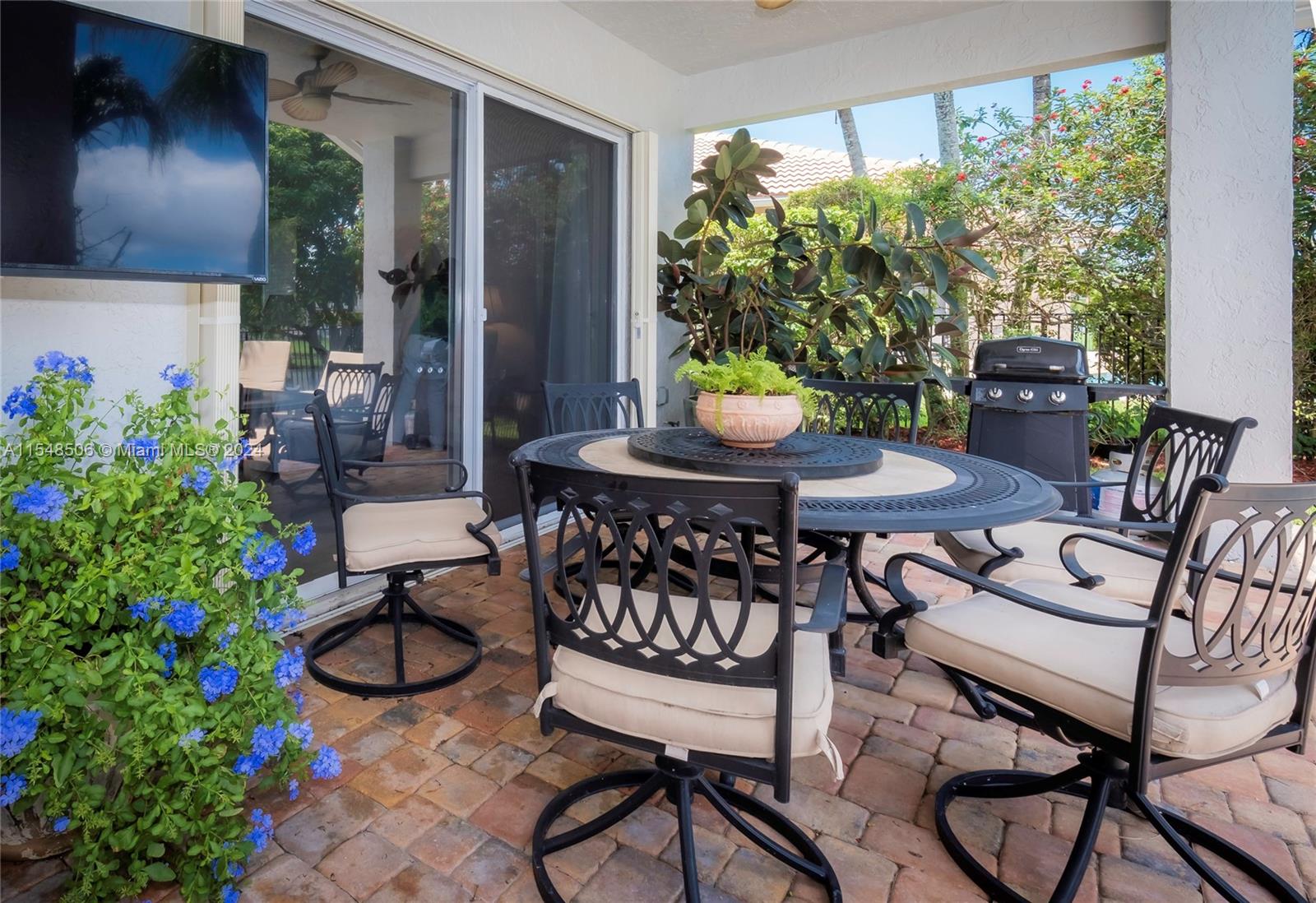 10849-10849 Bal Harbor Drive Boca Raton, FL 33498 - Photo 28 of 72 a view of a dining room with furniture window and outside view