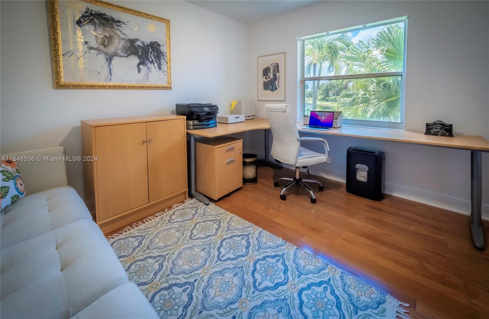 10849-10849 Bal Harbor Drive Boca Raton, FL 33498 - Photo 45 of 72 a workspace with furniture and a window