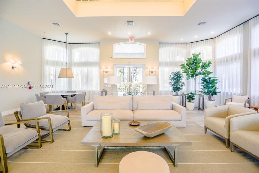 10849-10849 Bal Harbor Drive Boca Raton, FL 33498 - Photo 55 of 72 a living room with furniture and a large window