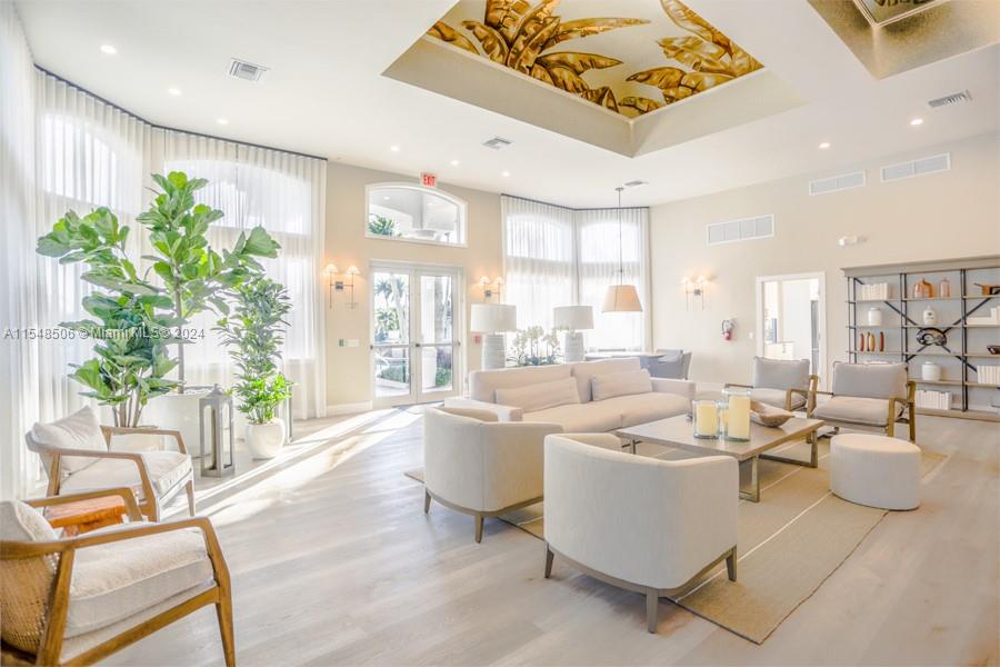 10849-10849 Bal Harbor Drive Boca Raton, FL 33498 - Photo 58 of 72 a living room with furniture and a large window