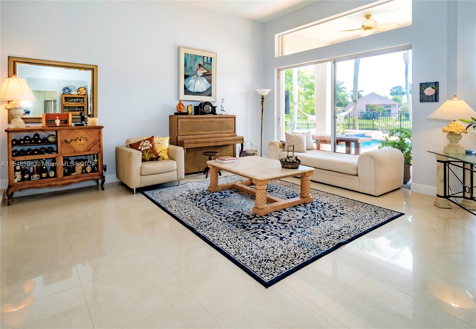10849-10849 Bal Harbor Drive Boca Raton, FL 33498 - Photo 10 of 72 a living room with furniture and a rug