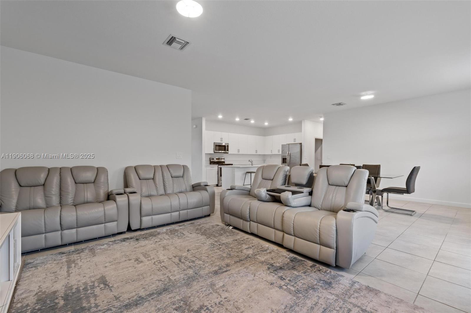11903 Southwest 241st Street Homestead, FL 33032 - Photo 17 of 56 a living room with furniture and a couch