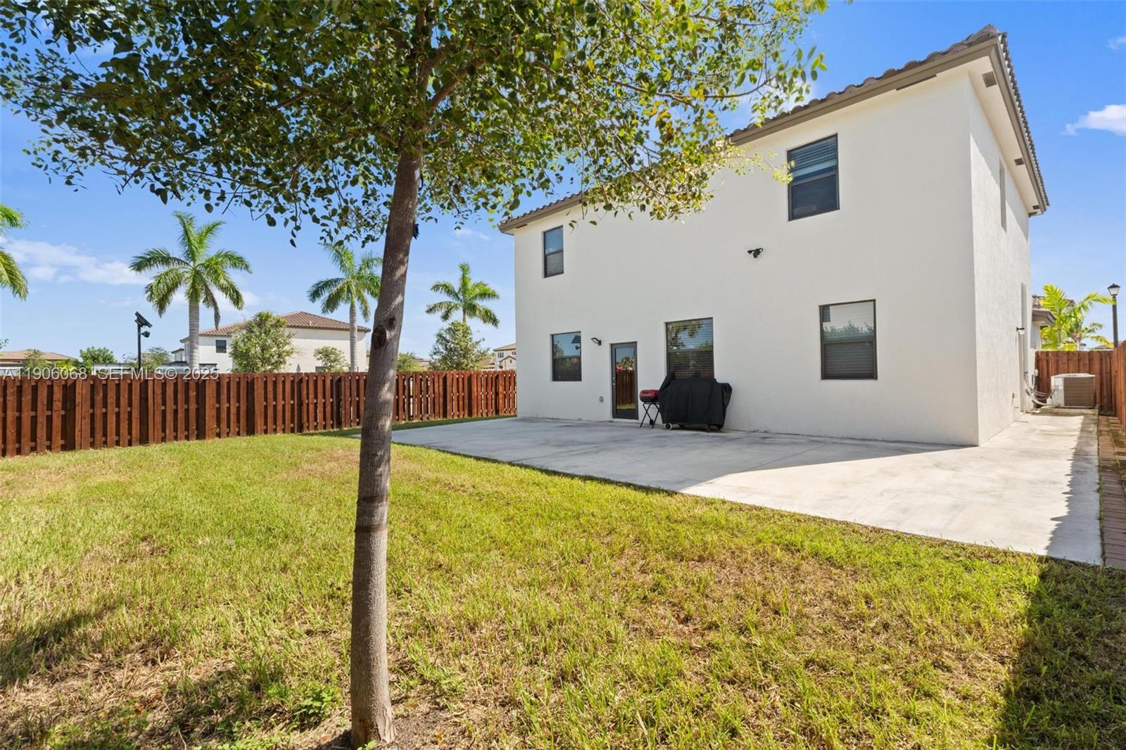 11903 Southwest 241st Street Homestead, FL 33032 - Photo 23 of 56 a view of a backyard of the house