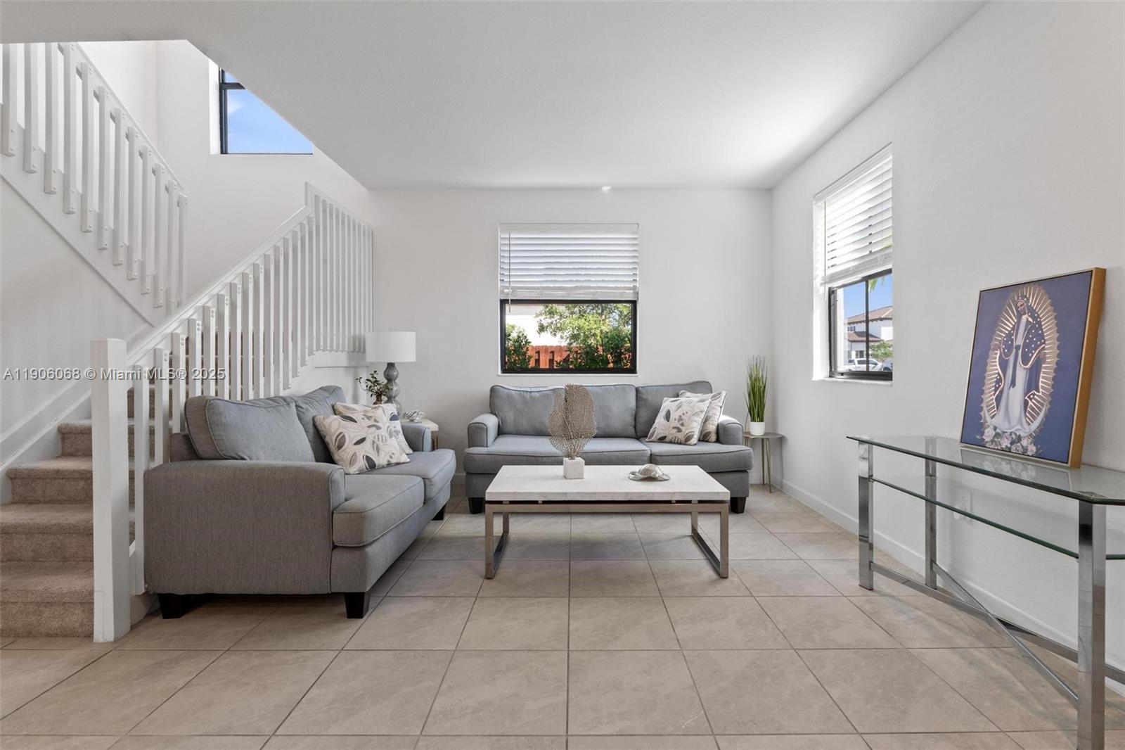 11903 Southwest 241st Street Homestead, FL 33032 - Photo 5 of 56 a living room with furniture and a window