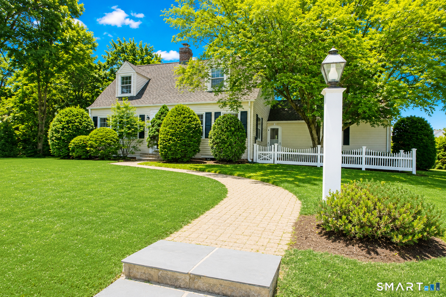 23 Norway Road North Haven, CT 06473 - Photo 2 of 32 a front view of a house with yard and green space
